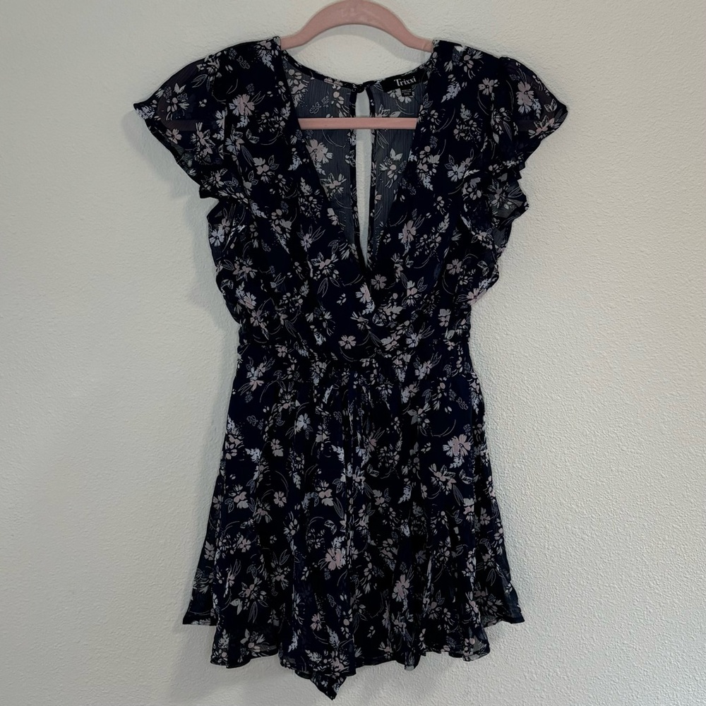 Francesca’s Tracy flutter sleeve navy floral romper
